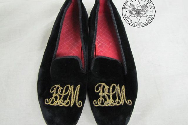 Black velveteen slippers, size 8Â½, red quilted lining, âBLMâ embroidered with gold thread.